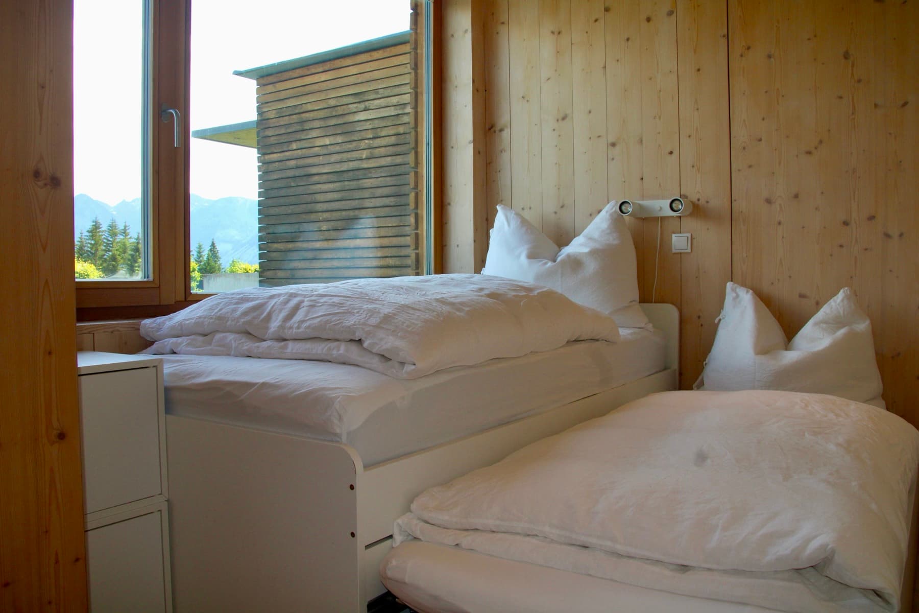 Helles Schlafzimmer mit Bergblick – Apartment Berglinie Ramsau am Dachstein